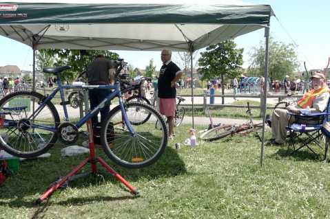 A free bicycle repair shop at a Big Give event.
